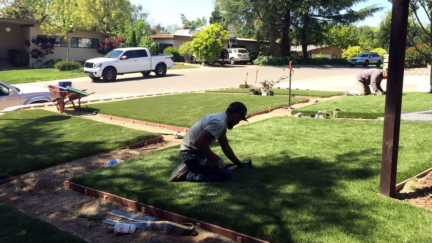 man working on landscaping